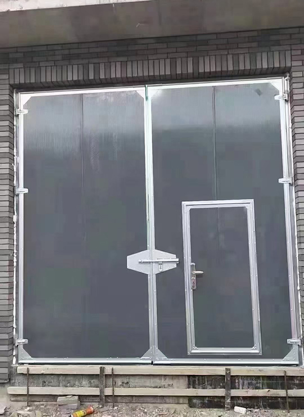 临洮工业平开门在大型设备制造车间的应用实例